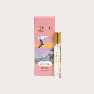 Red Hill Candle Co. perfume bottle and packaging on a light gray background